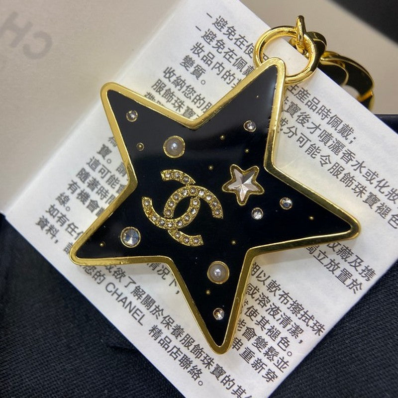 18K CC Black Gold Star Brooch