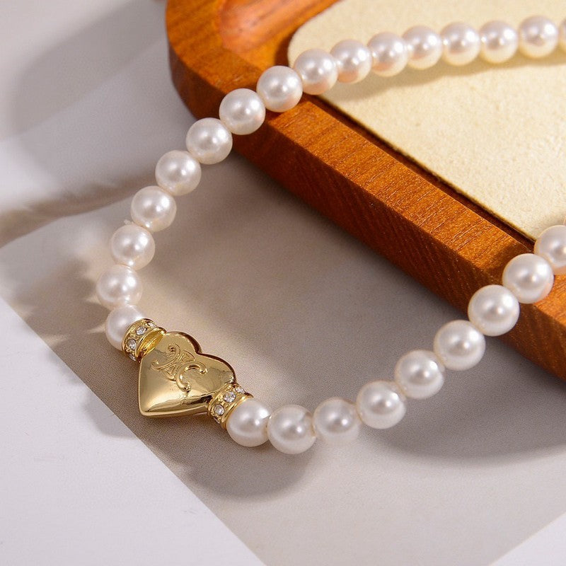 18K Triomphe Pearls Necklace