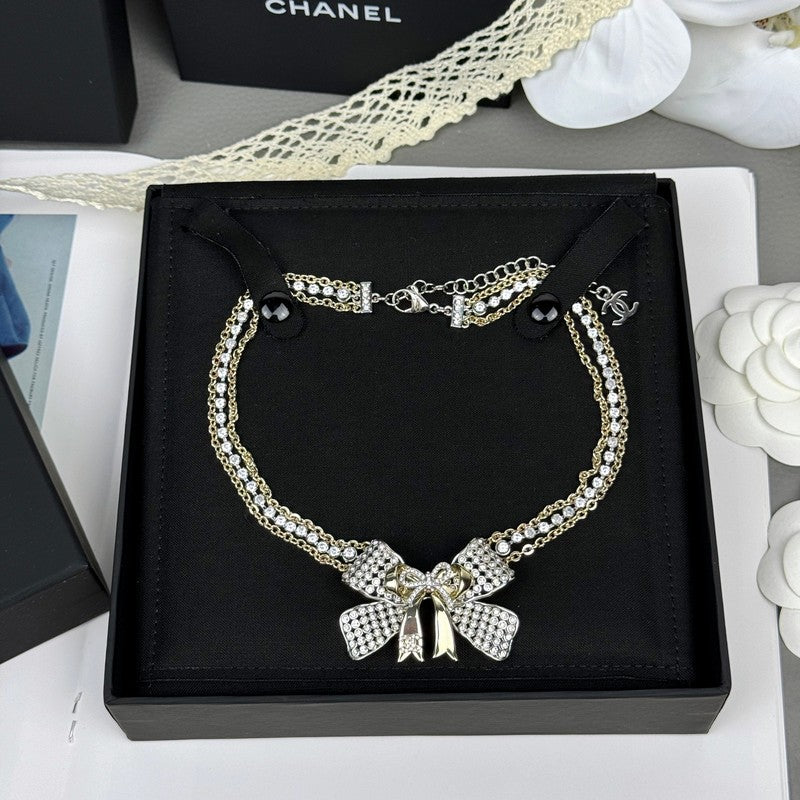 18K CC 25K Bow Tie Choker Necklace