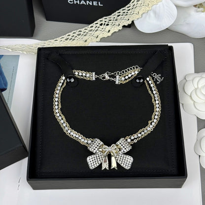 18K CC 25K Bow Tie Choker Necklace