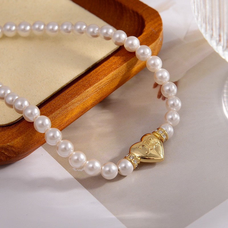 18K Triomphe Pearls Necklace