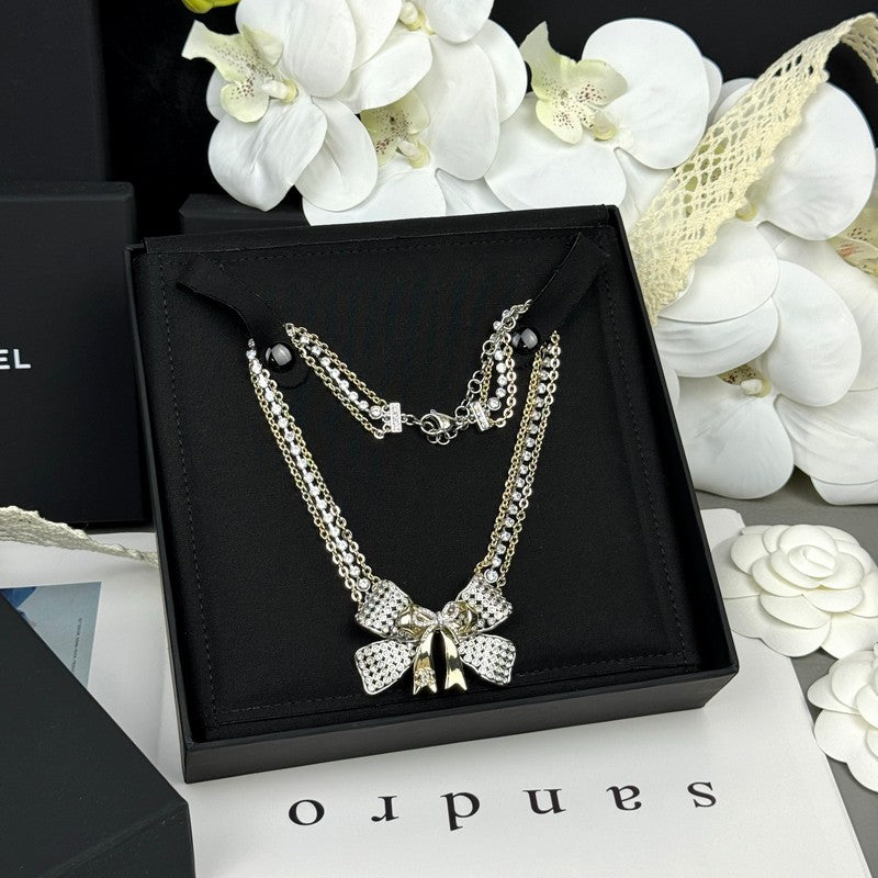 18K CC 25K Bow Tie Choker Necklace
