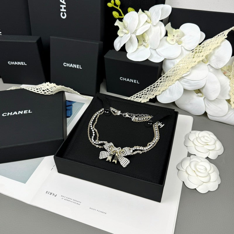 18K CC 25K Bow Tie Choker Necklace