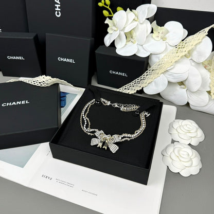 18K CC 25K Bow Tie Choker Necklace