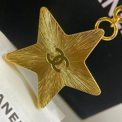 18K CC Black Gold Star Brooch