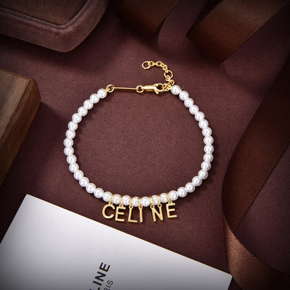 18K Triomphe Paris Pearls Bracelet